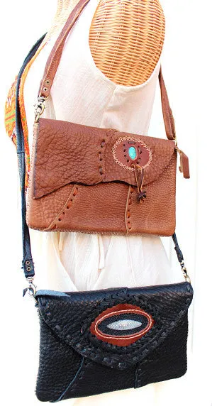Handmade Cowhide leather adjustable clutch/purse with stone accent