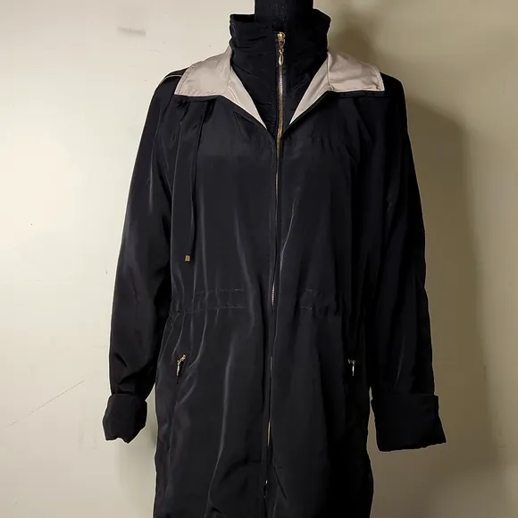 Outbrook  black and tan  hooded rain technical windbreaker jacket size small.