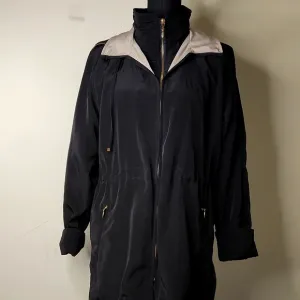Outbrook  black and tan  hooded rain technical windbreaker jacket size small.