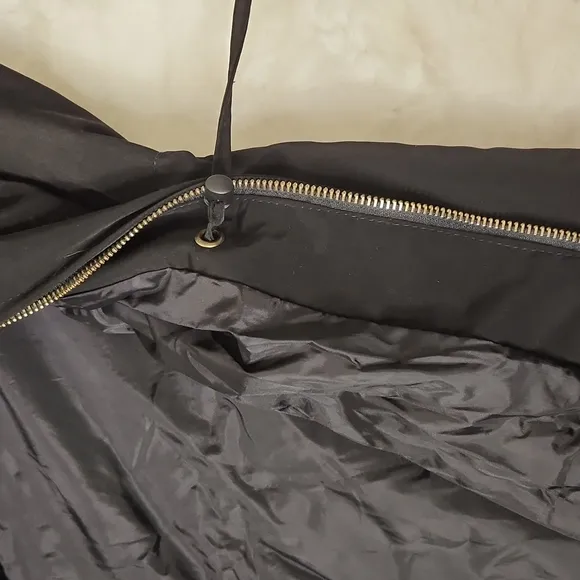 Outbrook  black and tan  hooded rain technical windbreaker jacket size small.